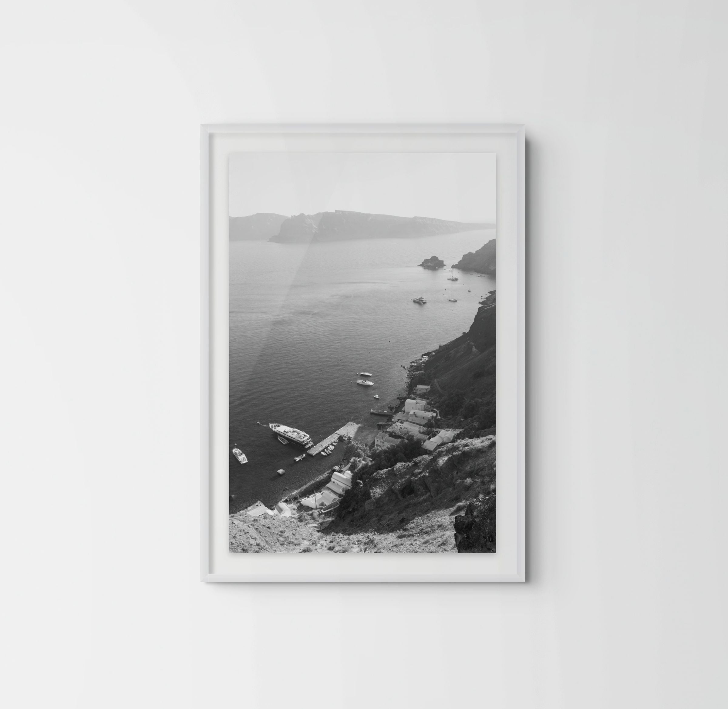 Black & White Santorini Fine Art Print of Armeni Bay, Oia in a white frame with passe-partout