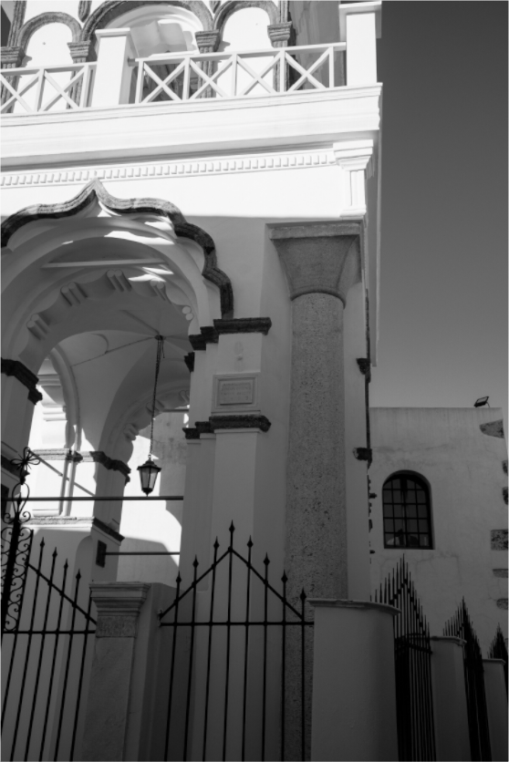 Black and white fine art photograph of historic architecture in Emborio village, Santorini.
